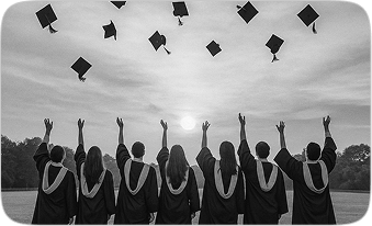 Graduates throwing caps in the air